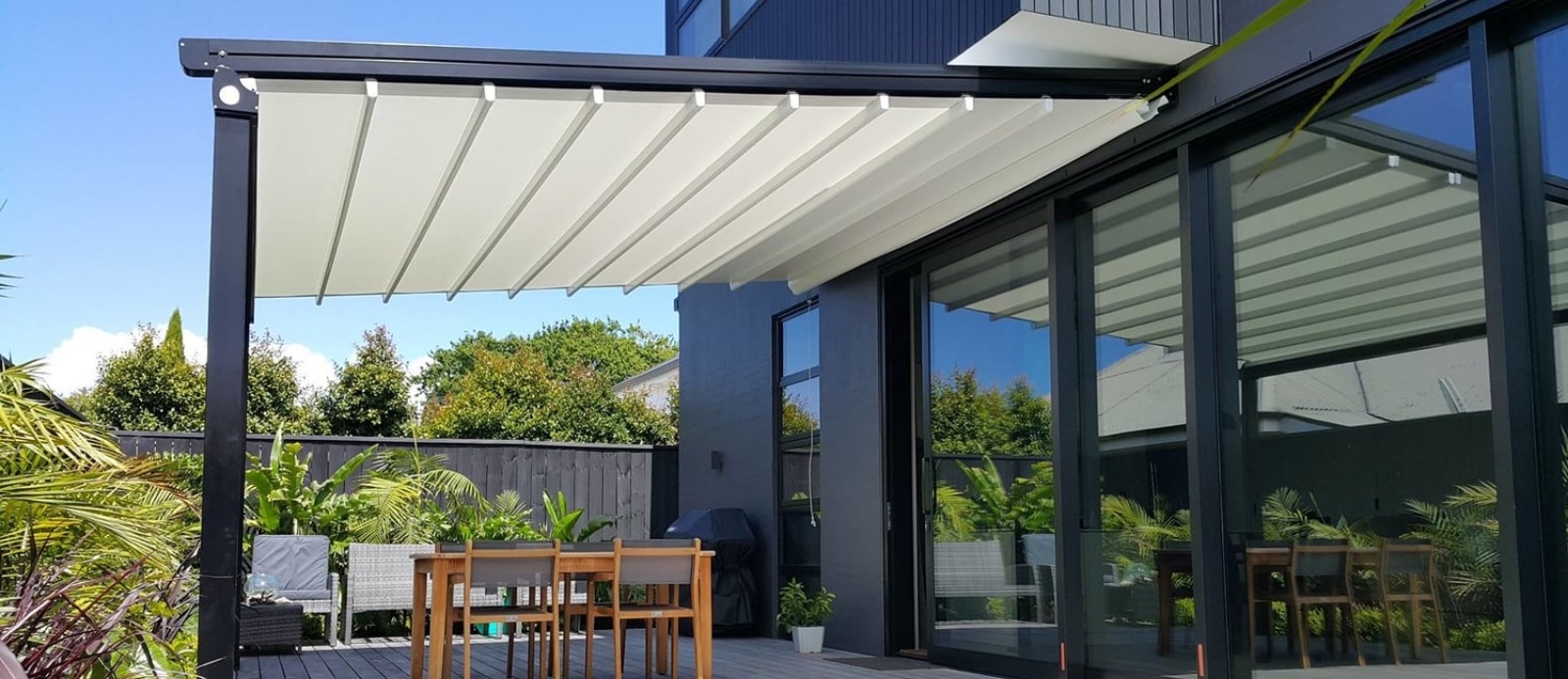 RETRACTABLE FABRIC ROOFING